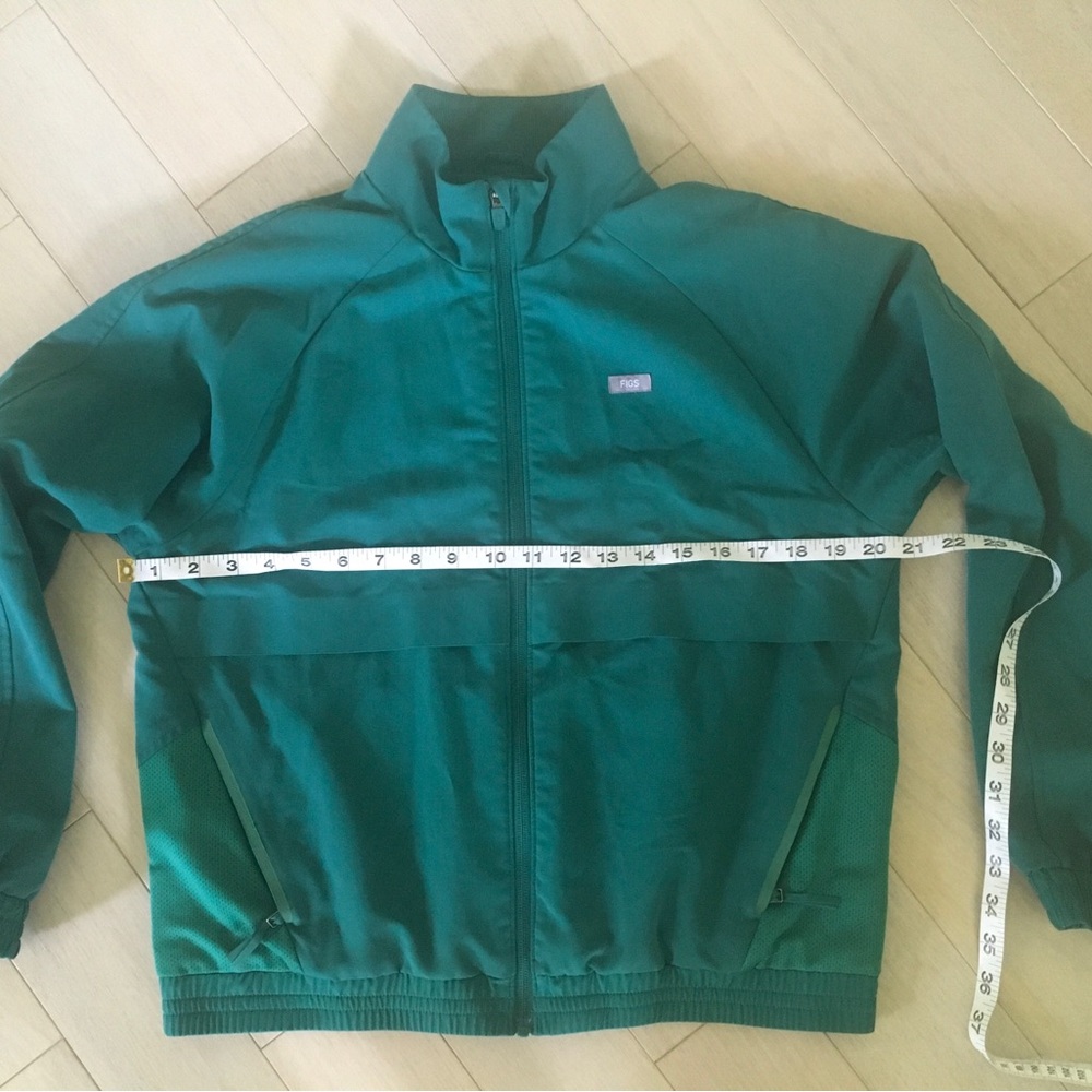 FIGS Sydney Scrub Jacket in a hunter green color - Picture 5 of 13